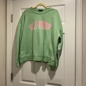 Primark Green Crew Neck Sweater with Pink Lettering